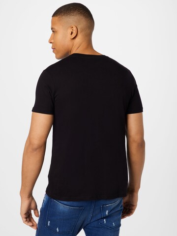 ALPHA INDUSTRIES - Camiseta 'NASA' en negro