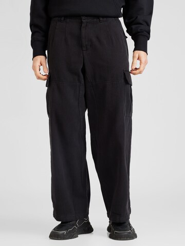 Loosefit Pantalon cargo TOPMAN en noir : devant