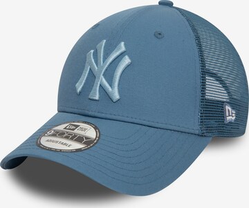 NEW ERA Cap 'HOME FIELD 9FORTY TRUCKER NEYYAN' in Blue: front