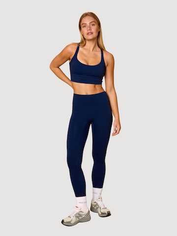 YO-GAYA Skinny Leggings in Blue: front