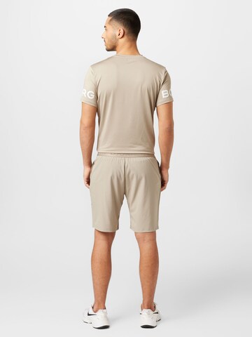 BJÖRN BORG - Regular Calças de desporto em bege