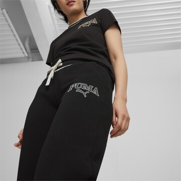 Effilé Pantalon de sport PUMA en noir