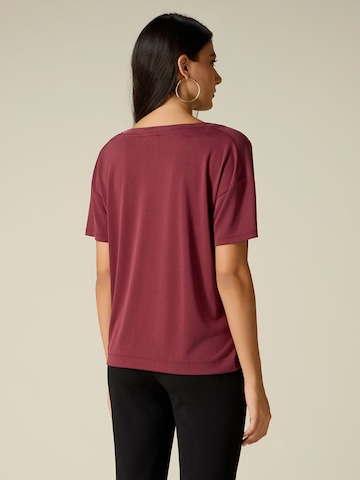 Maglietta di oltre in rosso