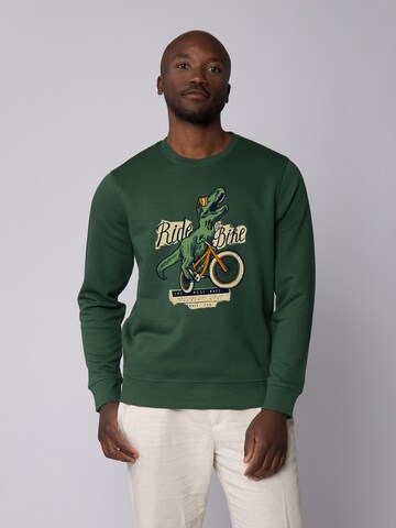 Felpa ' T-Rex Fahrrad ' di Watapparel in verde: frontale