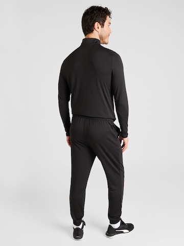 Effilé Pantalon de sport PUMA en noir