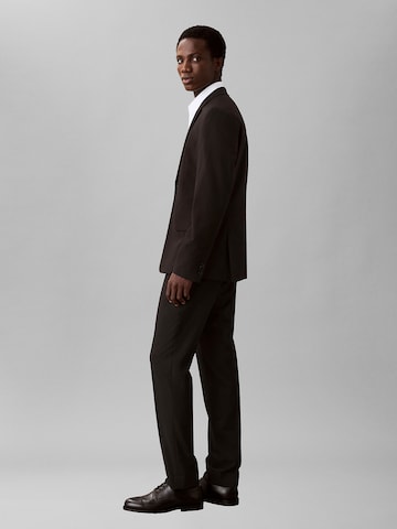 Coupe slim Pantalon à plis Calvin Klein en noir