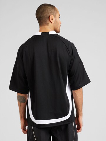 ADIDAS ORIGINALS T-Shirt 'Adilenium' in Schwarz