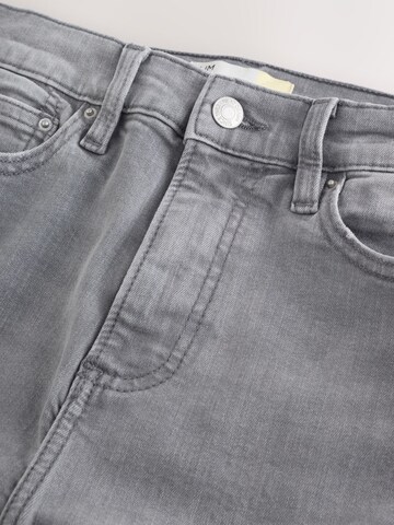 Next Slimfit Farkut värissä harmaa