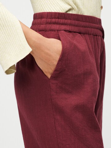 Wide Leg Pantalon 'ONLTizana' ONLY en rouge