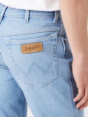 Slimfit Jeans 'Wrangler Texas Taper Lovesick W12TY728Q 112319945' di WRANGLER in blu
