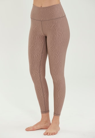 Athlecia Slim fit Workout Pants 'Alma' in Brown: front
