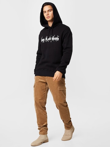 Han Kjøbenhavn Sweatshirt in Schwarz