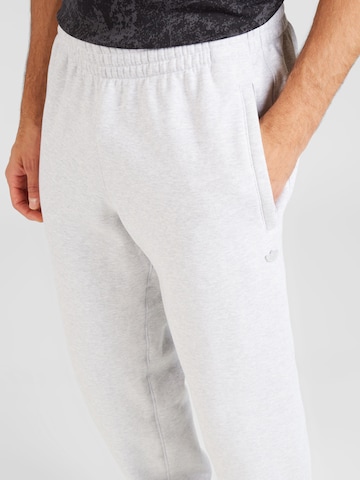 Tapered Pantaloni 'Premium Essentials' di ADIDAS ORIGINALS in grigio
