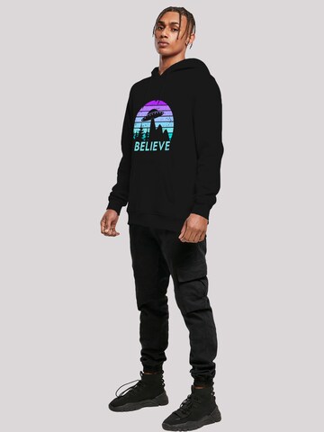 Sweat-shirt 'I Believe UFO Alien Raumschiff Retro' F4NT4STIC en noir