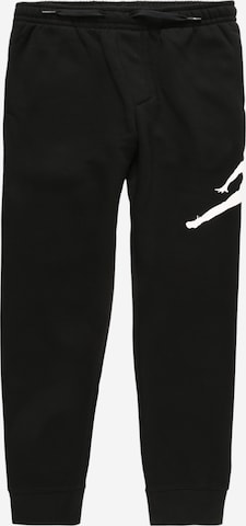 Jordan Tapered Trousers in Black: front