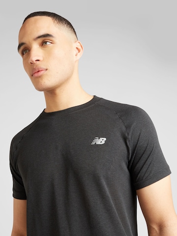 new balance Functioneel shirt 'Athletics' in Zwart