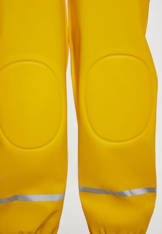 Effilé Pantalon fonctionnel Schmuddelwedda en jaune