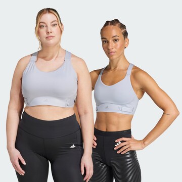 Bustino Reggiseno sportivo 'FastImpact Luxe' di ADIDAS PERFORMANCE in grigio: frontale