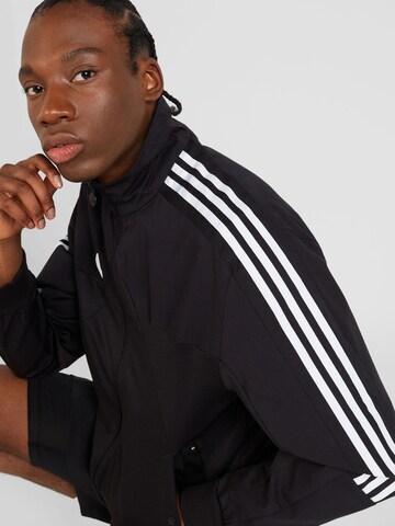 ADIDAS SPORTSWEAR Sportovní bunda 'Tiro' – černá