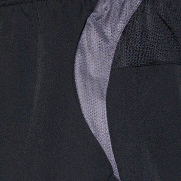 NIKE Regular Workout Pants 'Total90' in Black