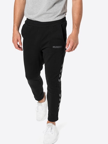 Hummel Дънки Tapered Leg Спортен панталон 'Legacy' в черно: отпред