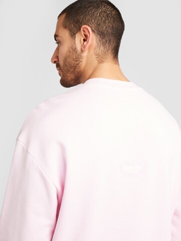 ADIDAS SPORTSWEAR - Sweatshirt de desporto em rosa