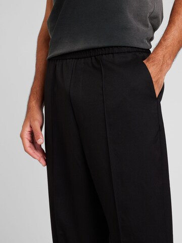 Wide leg Pantaloni con pieghe di TOPMAN in nero