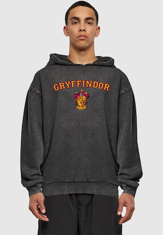 Sweat-shirt 'Harry Potter - Hogwarts Gryffindor Crest' ABSOLUTE CULT en noir : devant