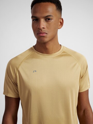 Newline Functioneel shirt 'Beat' in Bruin