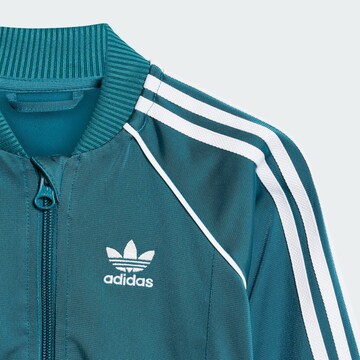 ADIDAS ORIGINALS Träningsoverall 'Adicolor' i grön