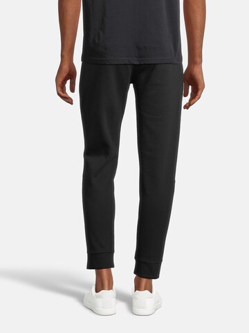 AÉROPOSTALE - Tapered Pantalón en negro