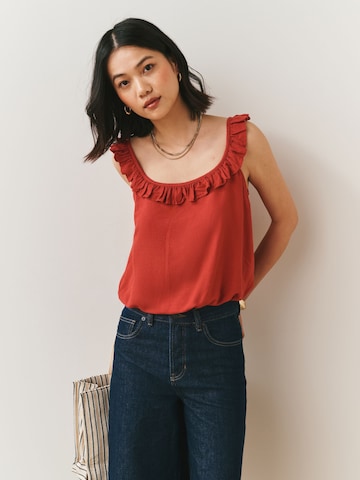 Haut Next en rouge : devant