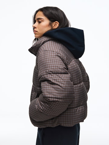 Bershka Winter jacket in Brown: side