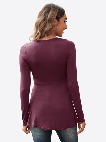 Tricou de la Imily Bela pe roșu: spate