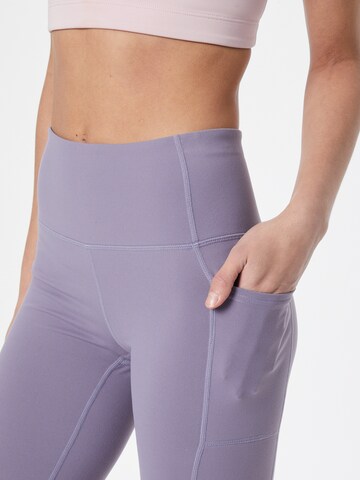 SKECHERS Skinny Workout Pants in Purple