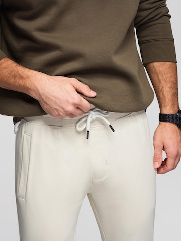Ombre Slimfit Sporthose‌‌‌ in Beige