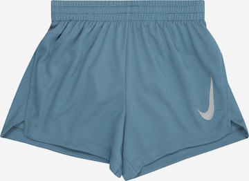 NIKE Workout Pants in Blue: front