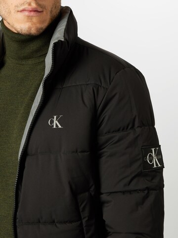 Calvin Klein Jeans Rovný strih Zimná bunda - Sivá