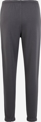 Effilé Pantalon de sport 'Vector' Reebok en gris