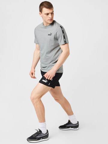 PUMA Sportshirt 'Essentials' in Grau