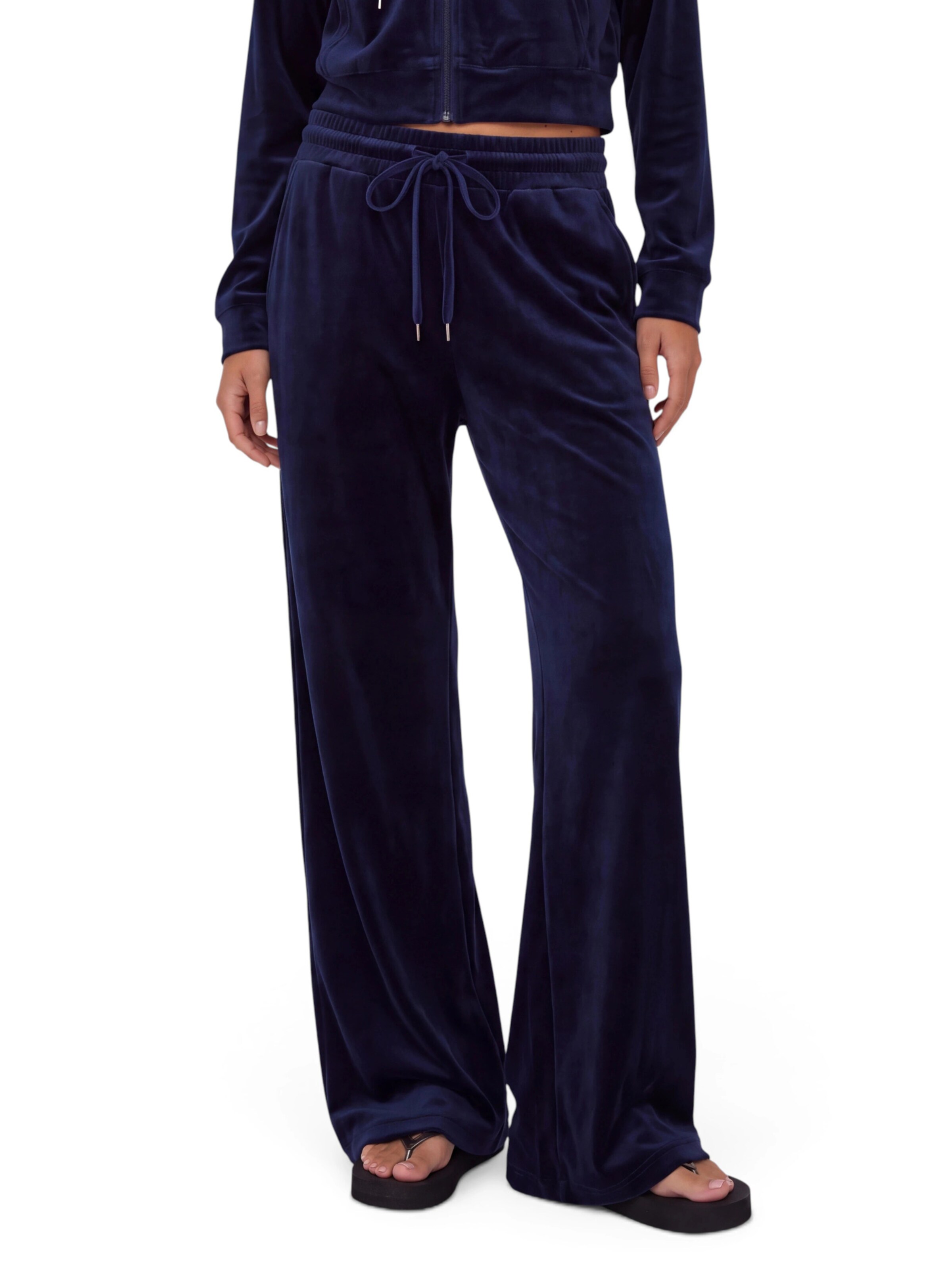 CHOLIDOU Flared Trousers in Blue: front