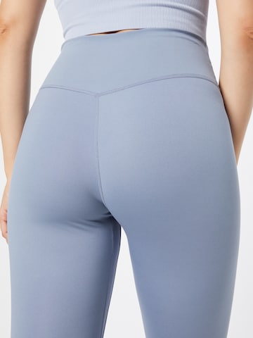 NIKE Skinny Workout Pants in Blue