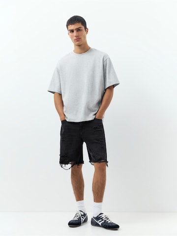 Pull&Bear Ohlapna forma Kavbojke | črna barva