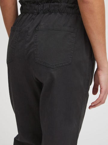 Tapered Pantaloni di Oxmo in nero