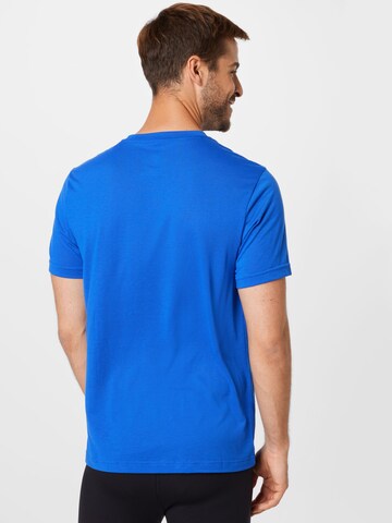Reebok Funkčné tričko - Modrá