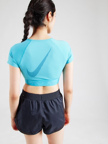 NIKE - Camiseta funcional en azul: frente