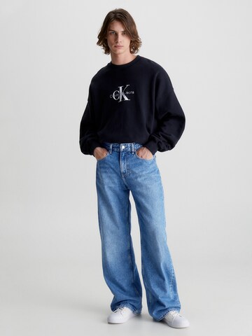 Calvin Klein Jeans Flared Jeans in Blue