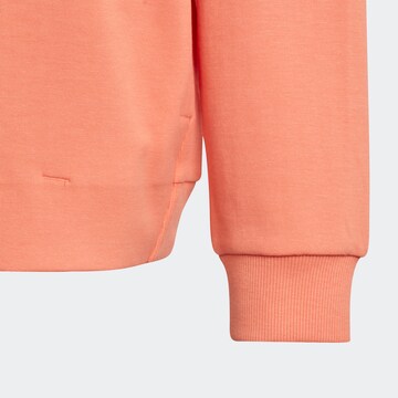 ADIDAS SPORTSWEAR - Sweatshirt de desporto 'Future Icons' em laranja