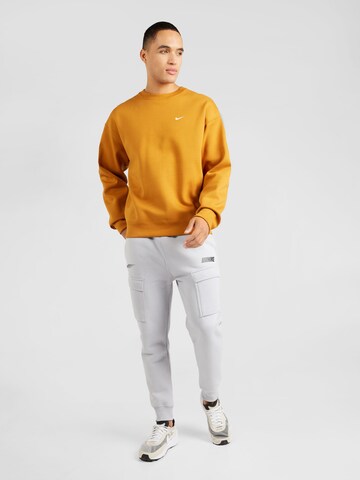 Nike Sportswear Sweatshirt 'Swoosh' in Geel