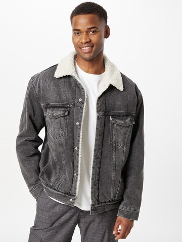 LEVI'S ® Between-Season Jacket 'Levi's® Men's Silver Tab™ Sherpa Trucker Jacket' in Black: front